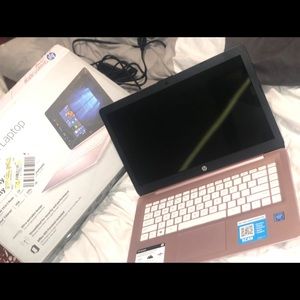 Rose gold HP laptop